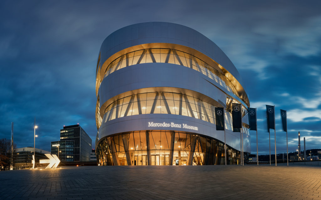 Low-angle perspective of illuminated Mercedes-Benz Museum and Da
